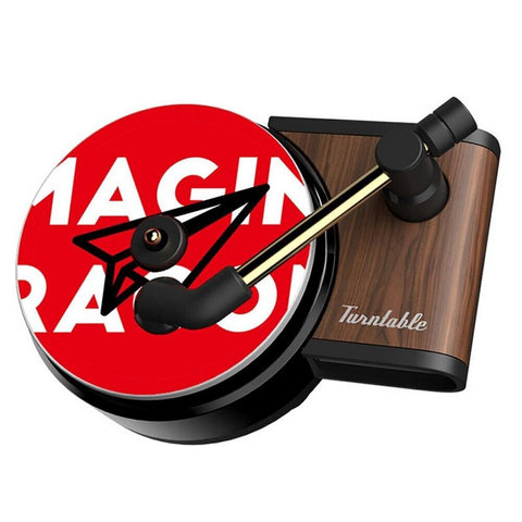 Vintage Record Car Freshener on car dashboard