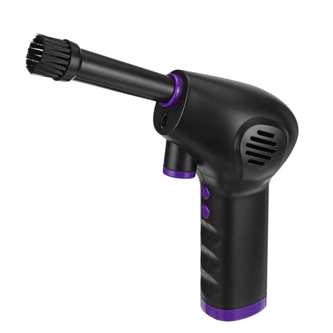 Cordless Air Duster cleaning a keyboard