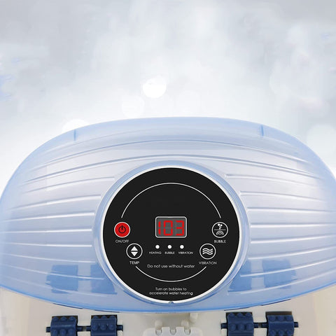 Heated foot bath with massage rollers
