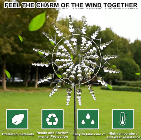 Flower-shaped metal wind spinner in a garden