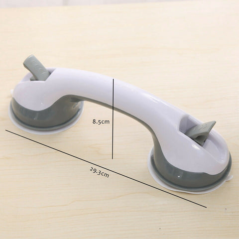 Close-up of suction cup grab bar on a tiled wall